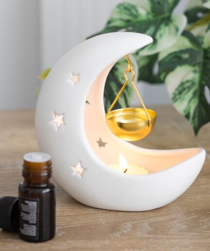 white ceramic crescent moon oil burner